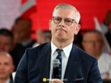 Były Szef BBN Otrzymuje Odszkodowanie i Krytykuje Premiera